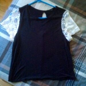 A thin black shirt with lace short sleeves barley worn